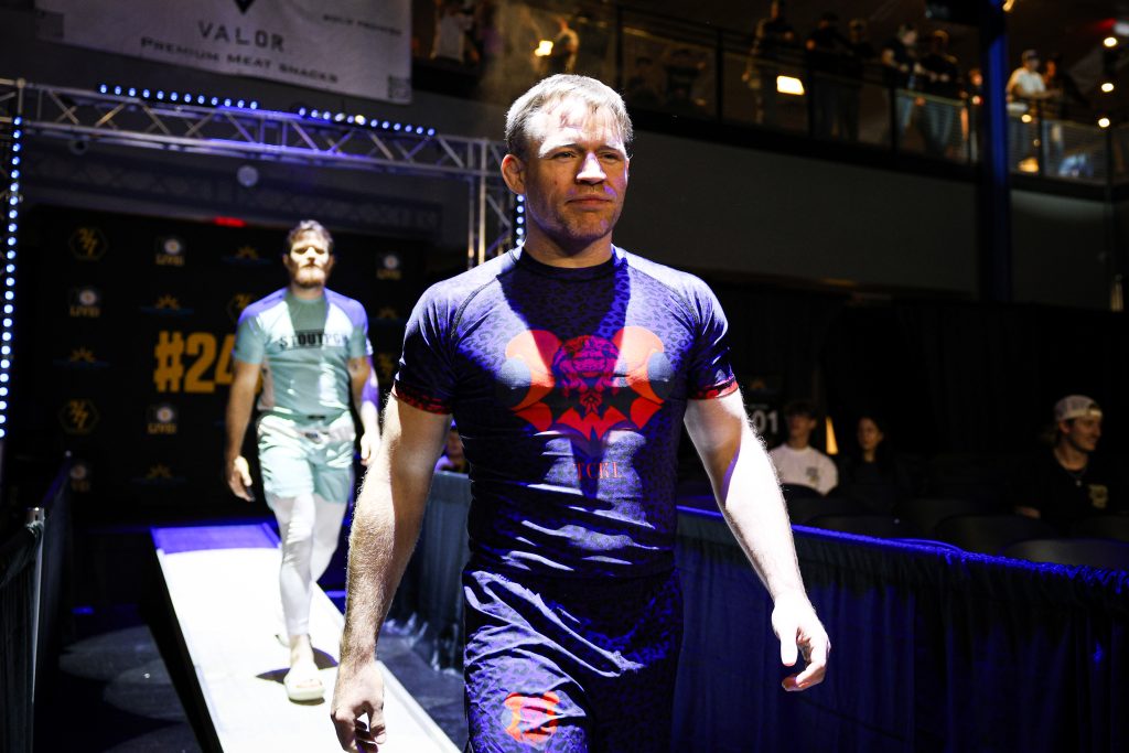 Michael Hudak walking out with James Neeley at the 247fighting grappling card at the Sunny Days Arena